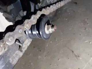 Rolă pentru întinzătorul de lanț