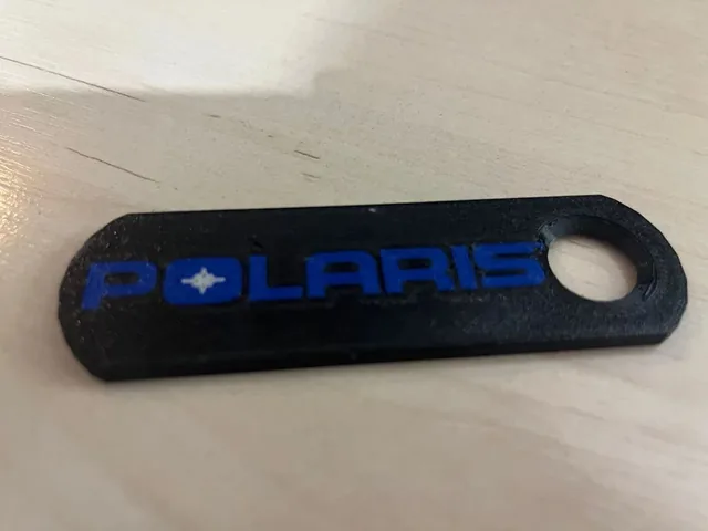 Breloc Polaris, variantă relief